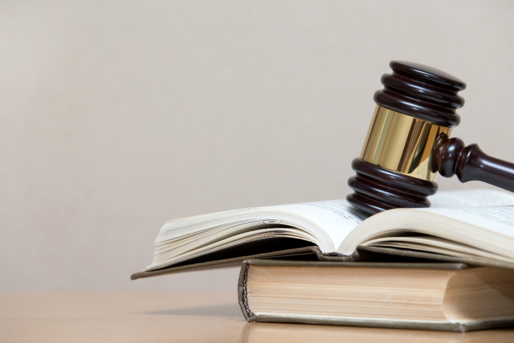 Wooden gavel and books